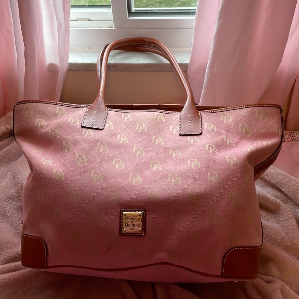 Gorgeous Dooney and Bourke pink and brown leather tote with matching wristlet.